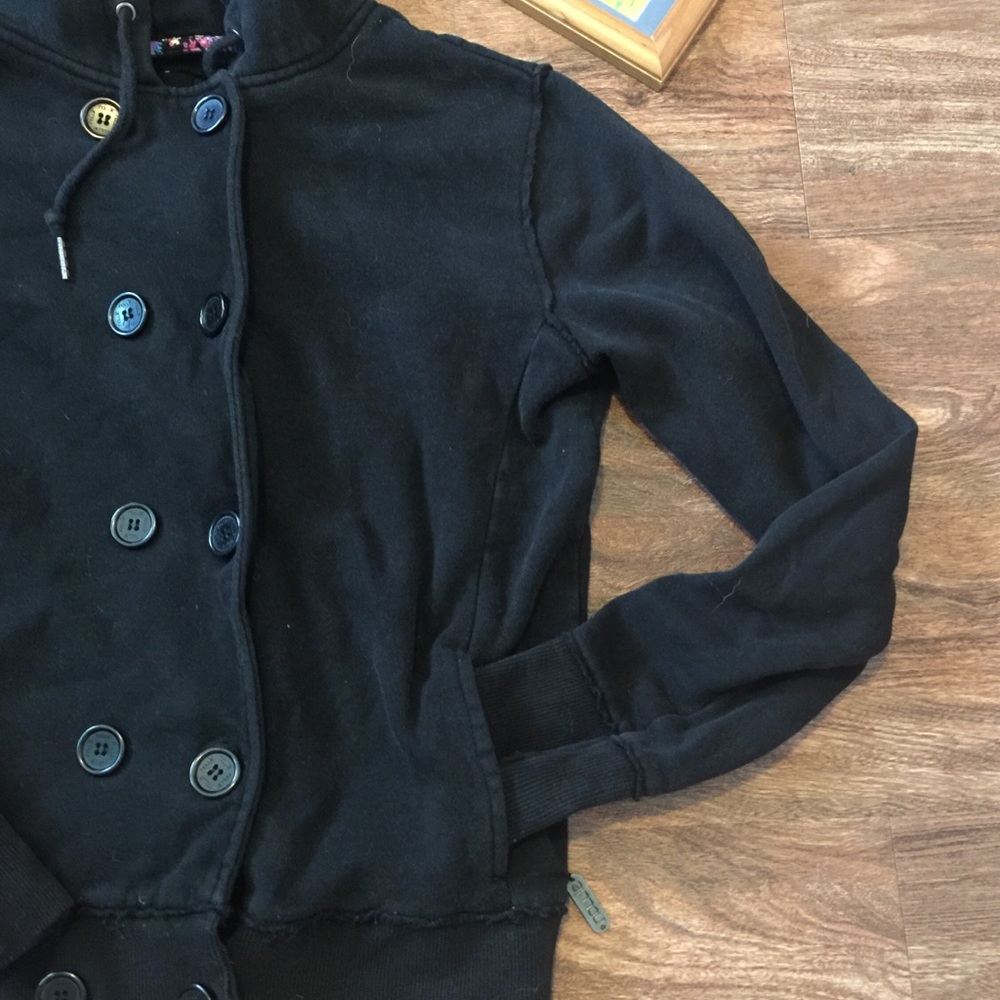 Black zip up hoodie.